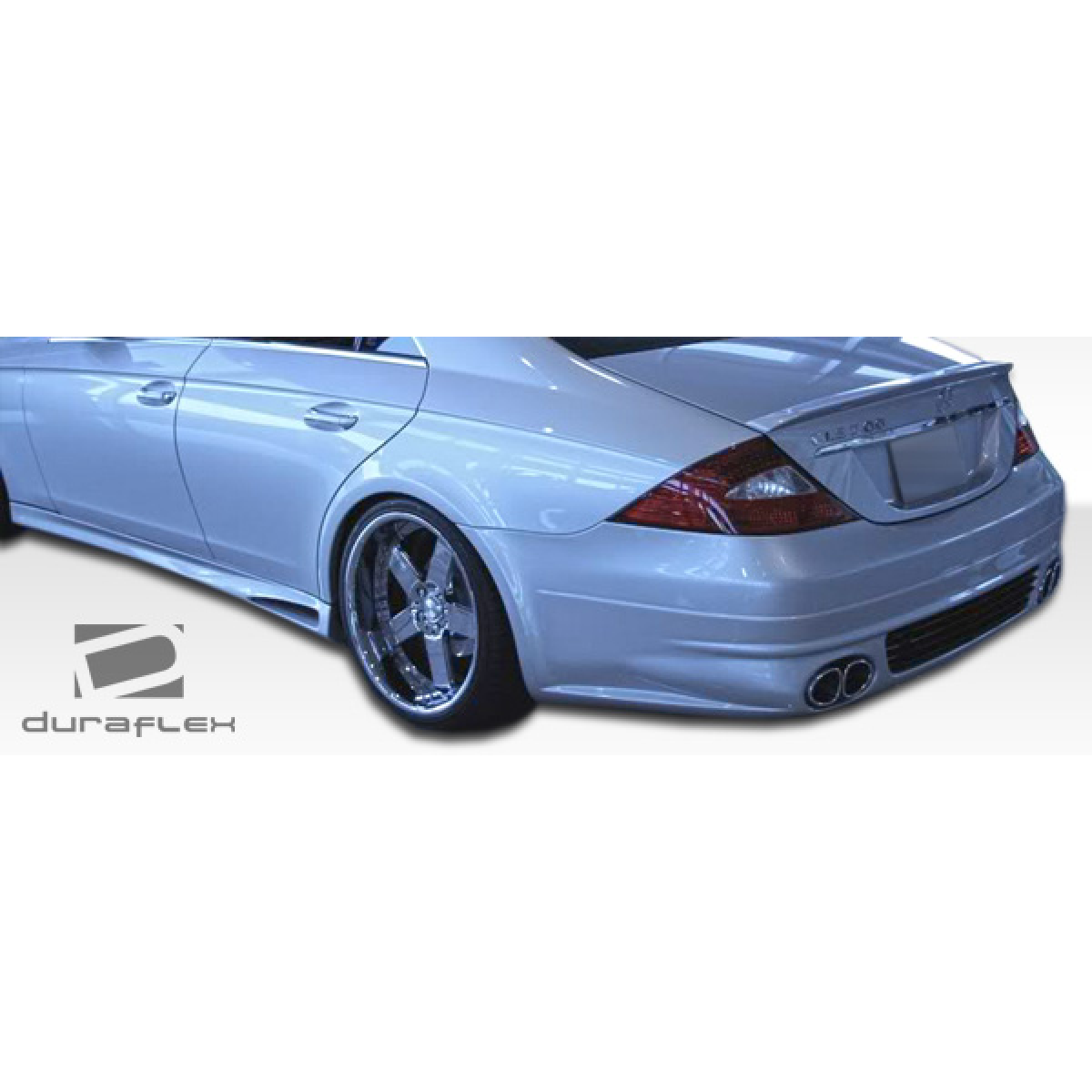 Modify your Mercedes-Benz CLS-Class 2006 with our Exterior/Complete Body Kits - The image shows a rear quarter angle view