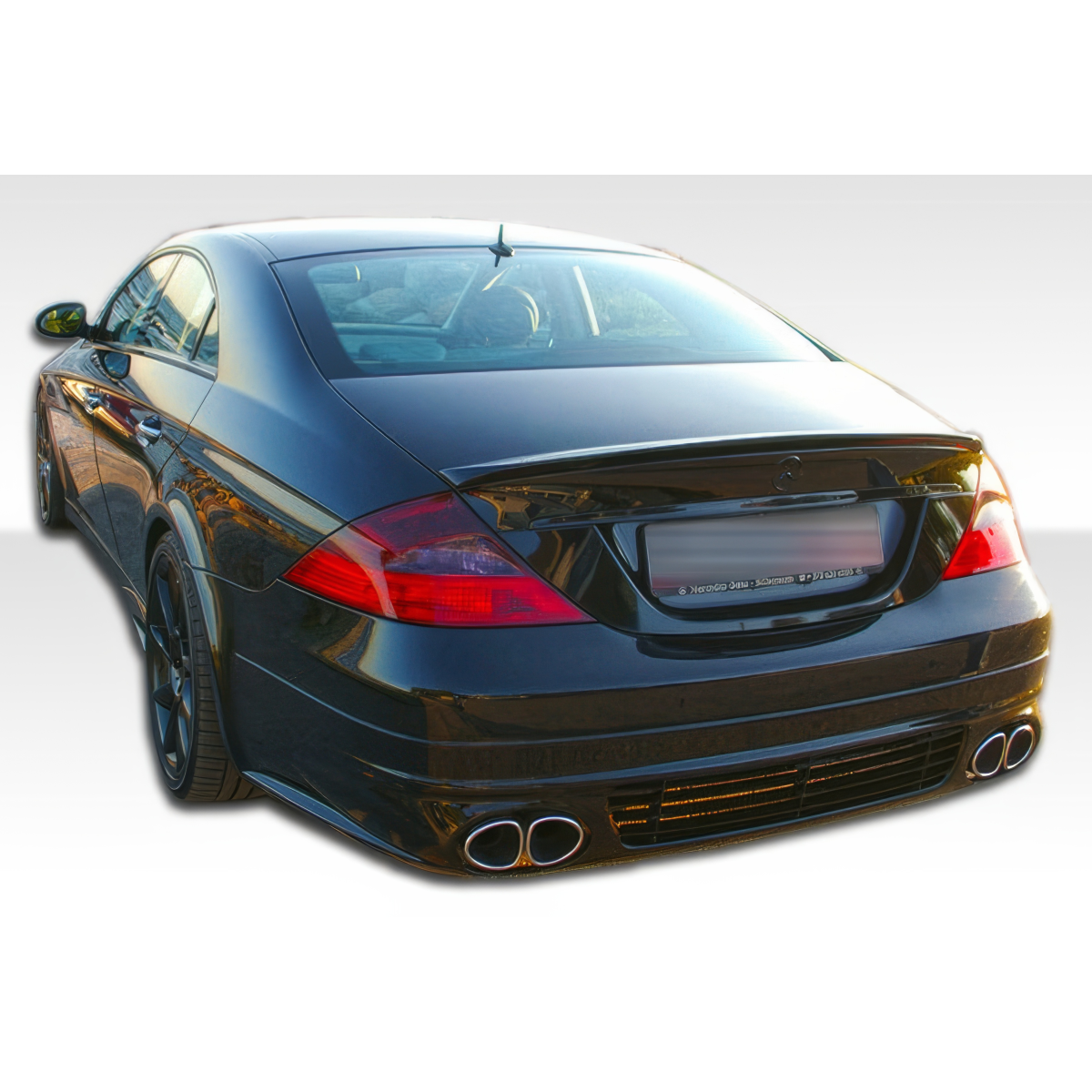 Modify your Mercedes-Benz CLS-Class 2006 with our Exterior/Rear Bumpers or Lips - Rear angle showcasing the bumper design