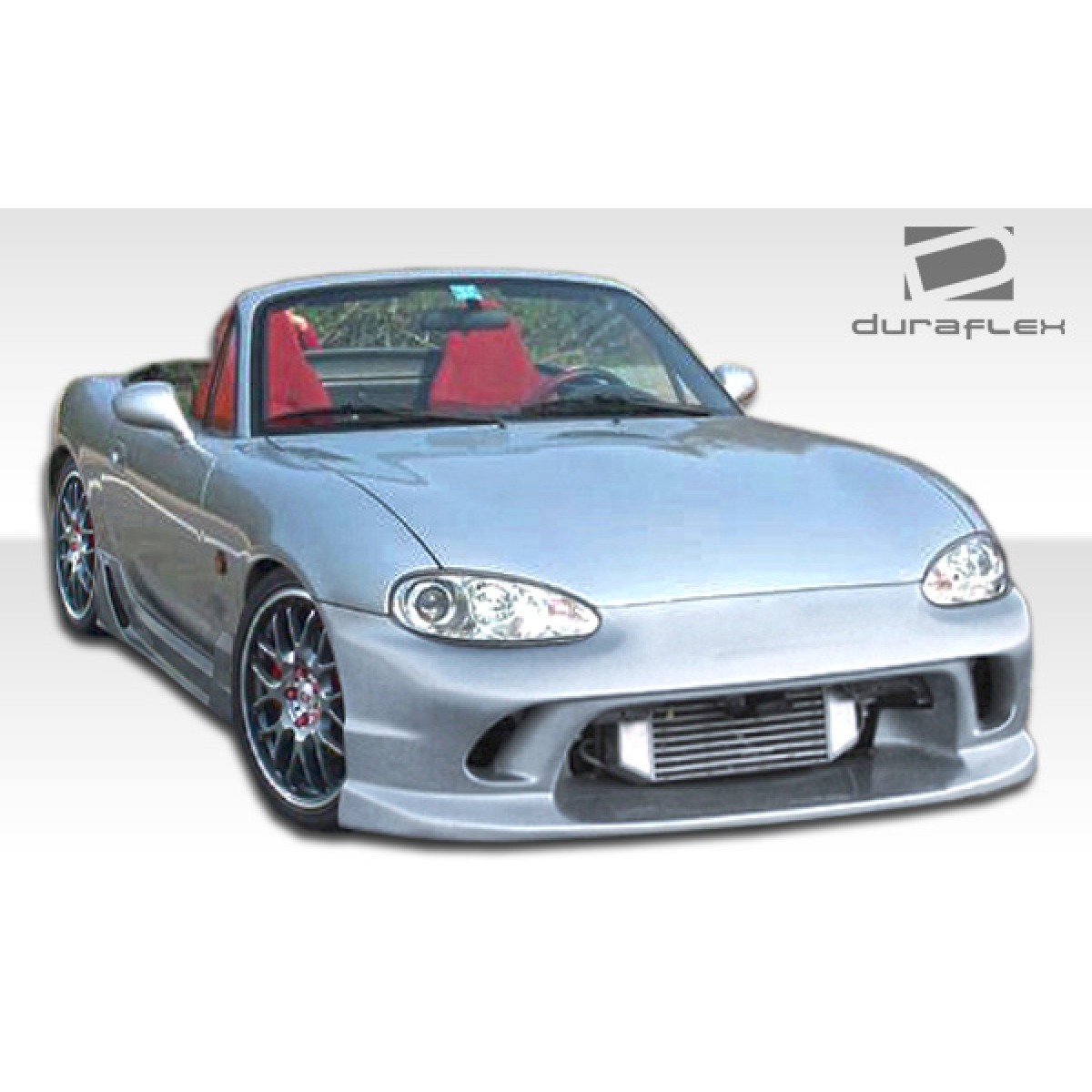 Modify your Mazda Miata 1999 with our Exterior/Side Skirts - Front quarter angle view of the car