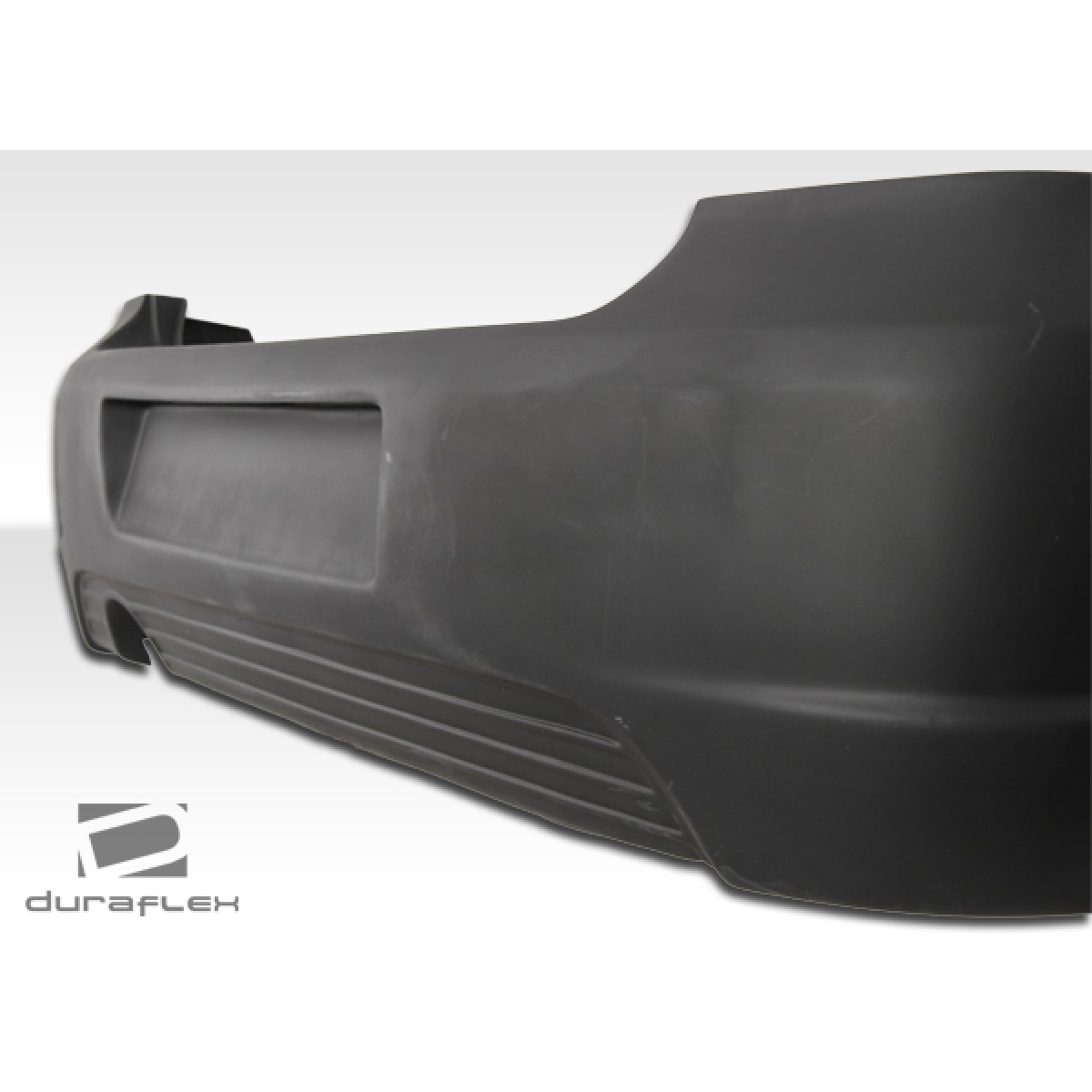 Modify your Volkswagen Golf 1999 with our Exterior/Rear Bumpers or Lips - The part is shown at a low side angle