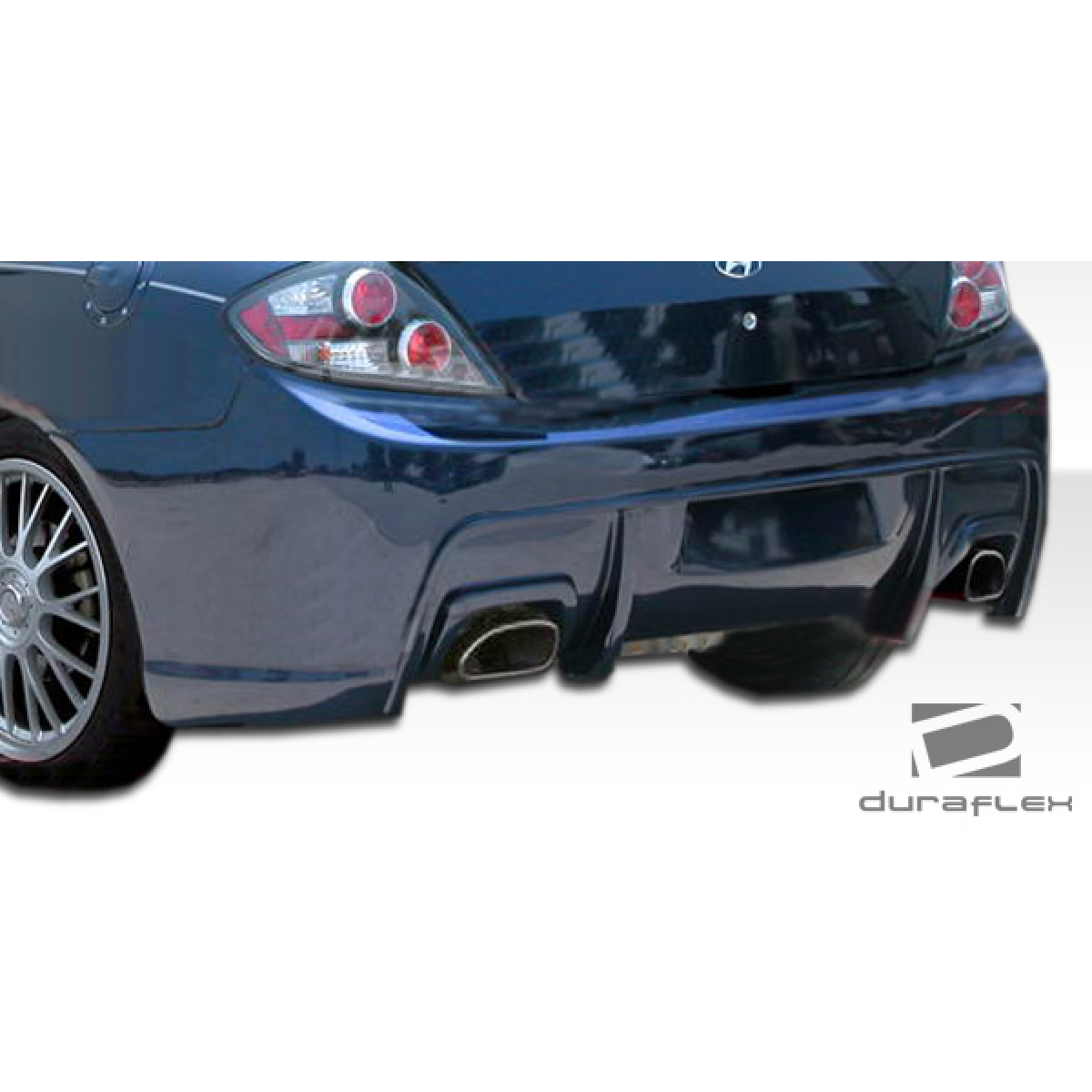 Modify your Hyundai Tiburon 2007 with our Exterior/Rear Bumpers - Rear angle showing bumper design and details