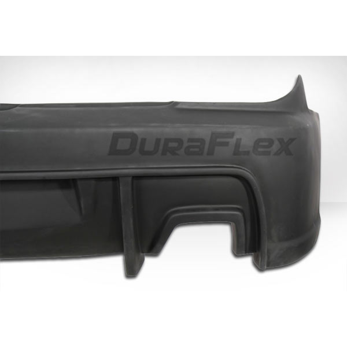 Modify your Hyundai Tiburon 2003 with our Exterior/Rear Bumpers or Lips - The part is viewed from a side angle