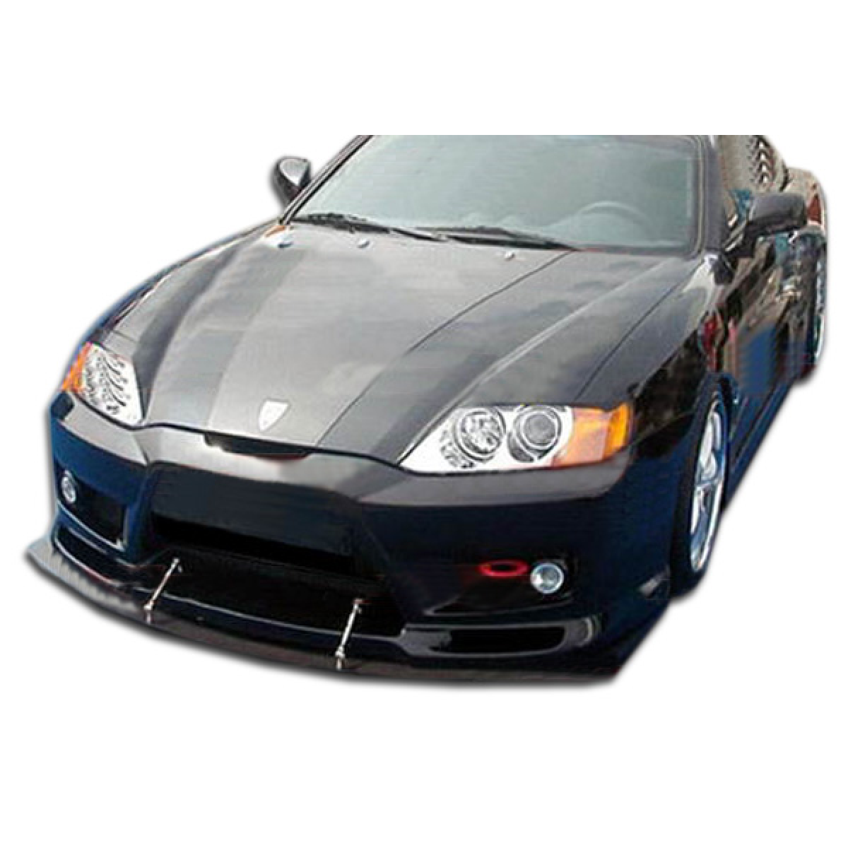 Modify your Hyundai Tiburon 2003 with our Exterior/Complete Body Kits - Front angled view of body kit for Tiburon