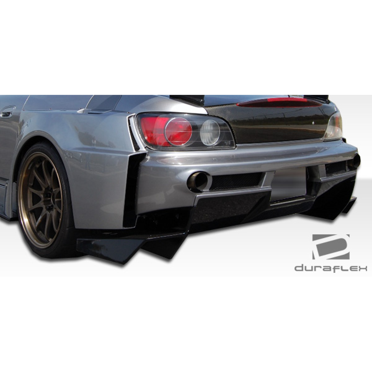 Modify your Honda S2000 2000 with our Exterior/Complete Body Kits - Angle showing rear view of modified Honda S2000