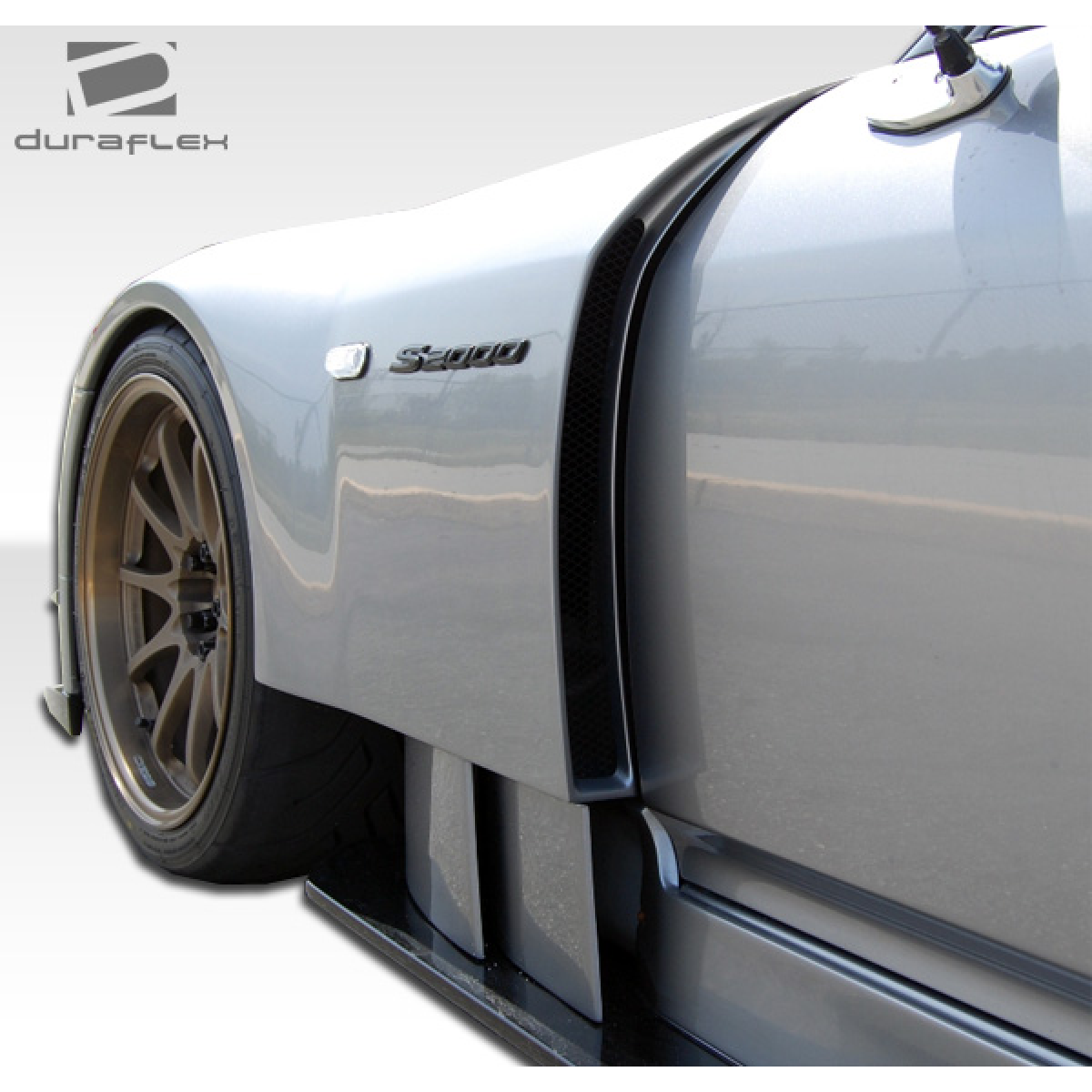 Modify your Honda S2000 2000 with our Exterior/Complete Body Kits - Side angle view highlighting fender design