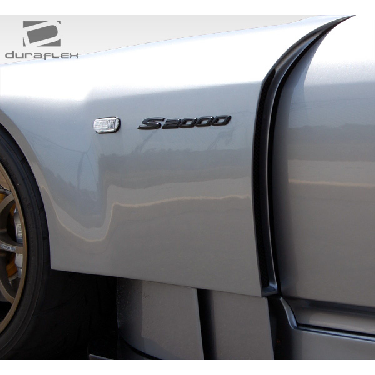 Modify your Honda S2000 2000 with our Exterior/Complete Body Kits - Side view showing the fender angle clearly