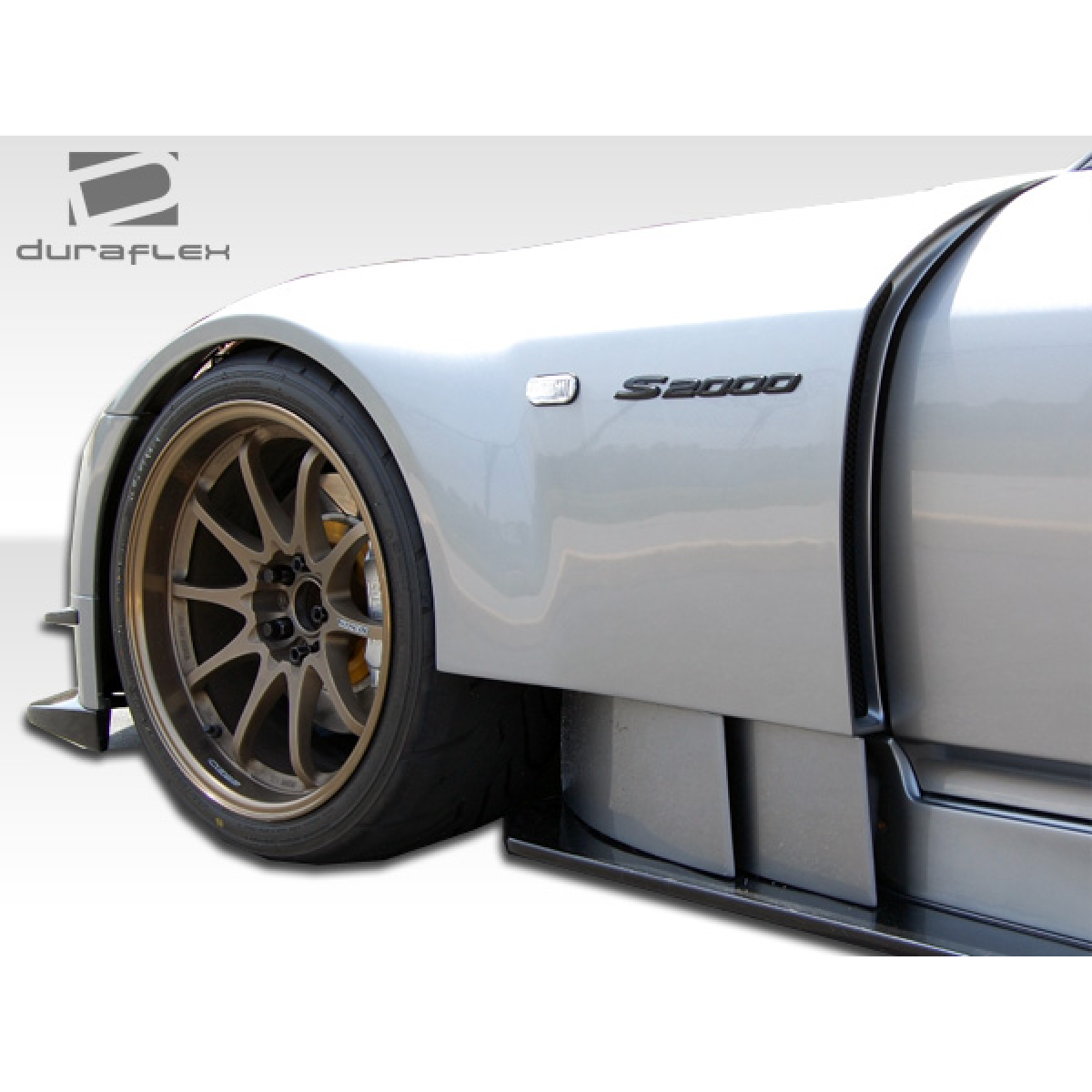 Modify your Honda S2000 2000 with our Exterior/Complete Body Kits - The part is viewed from a low angle side profile