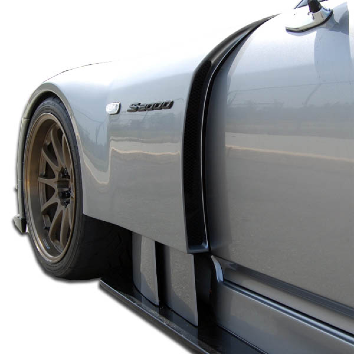 Modify your Honda S2000 2000 with our Exterior/Complete Body Kits - View is at a low angle from the side