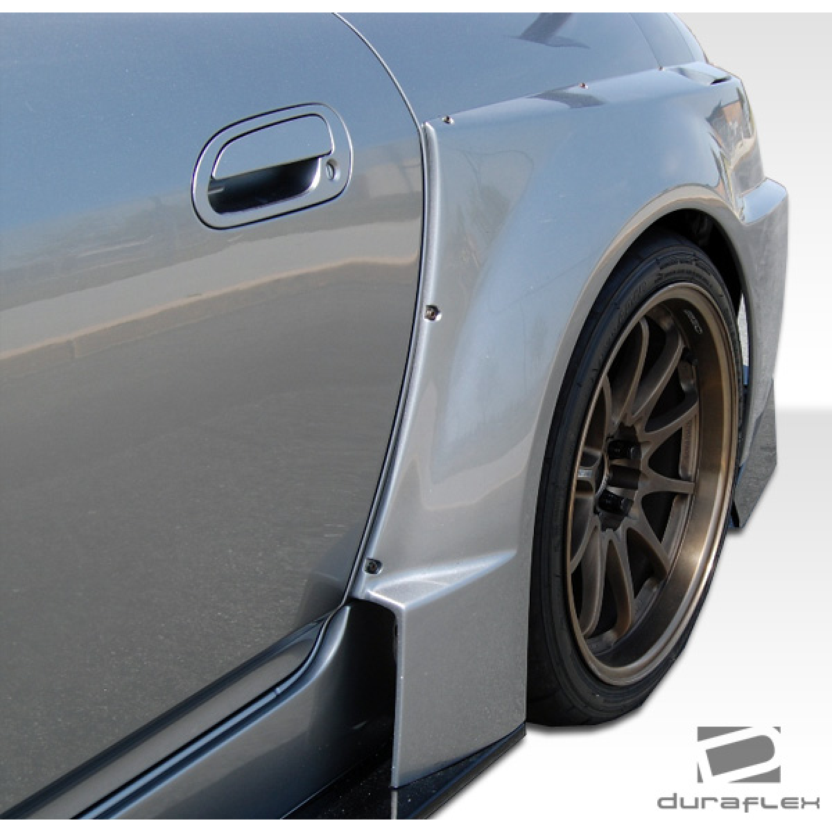 Modify your Honda S2000 2000 with our Exterior/Complete Body Kits - Angled view of rear fender flares on vehicle