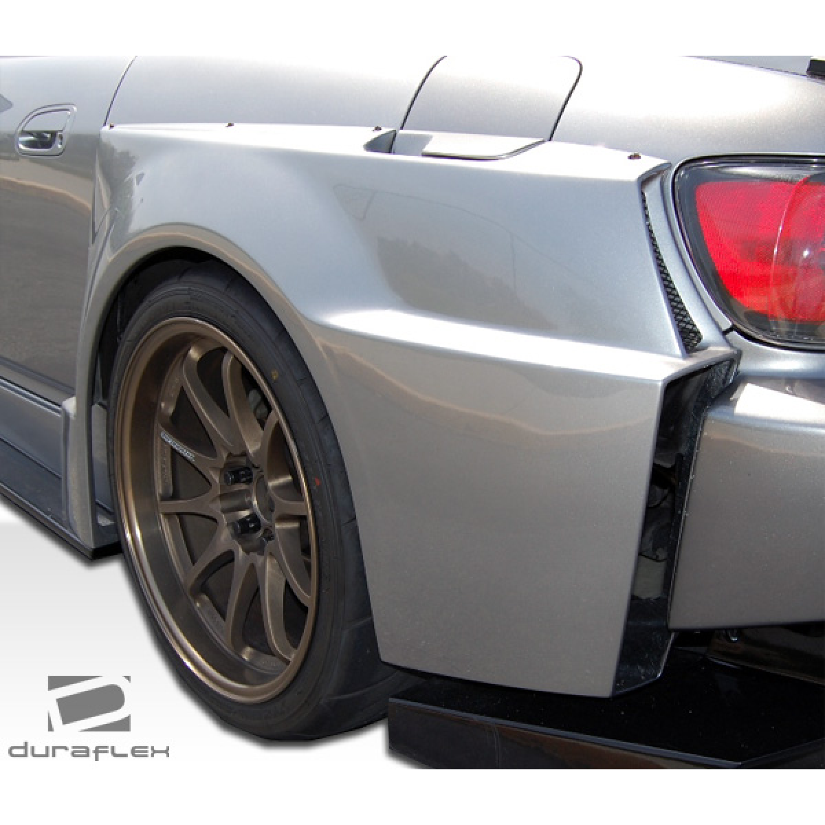 Modify your Honda S2000 2000 with our Exterior/Complete Body Kits - Side angle showing rear fender flare detail