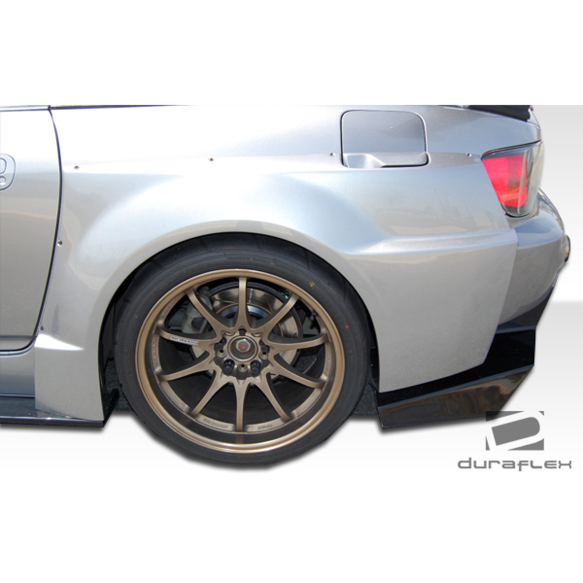 Modify your Honda S2000 2000 with our Exterior/Complete Body Kits - Side view showcasing fender flare angle