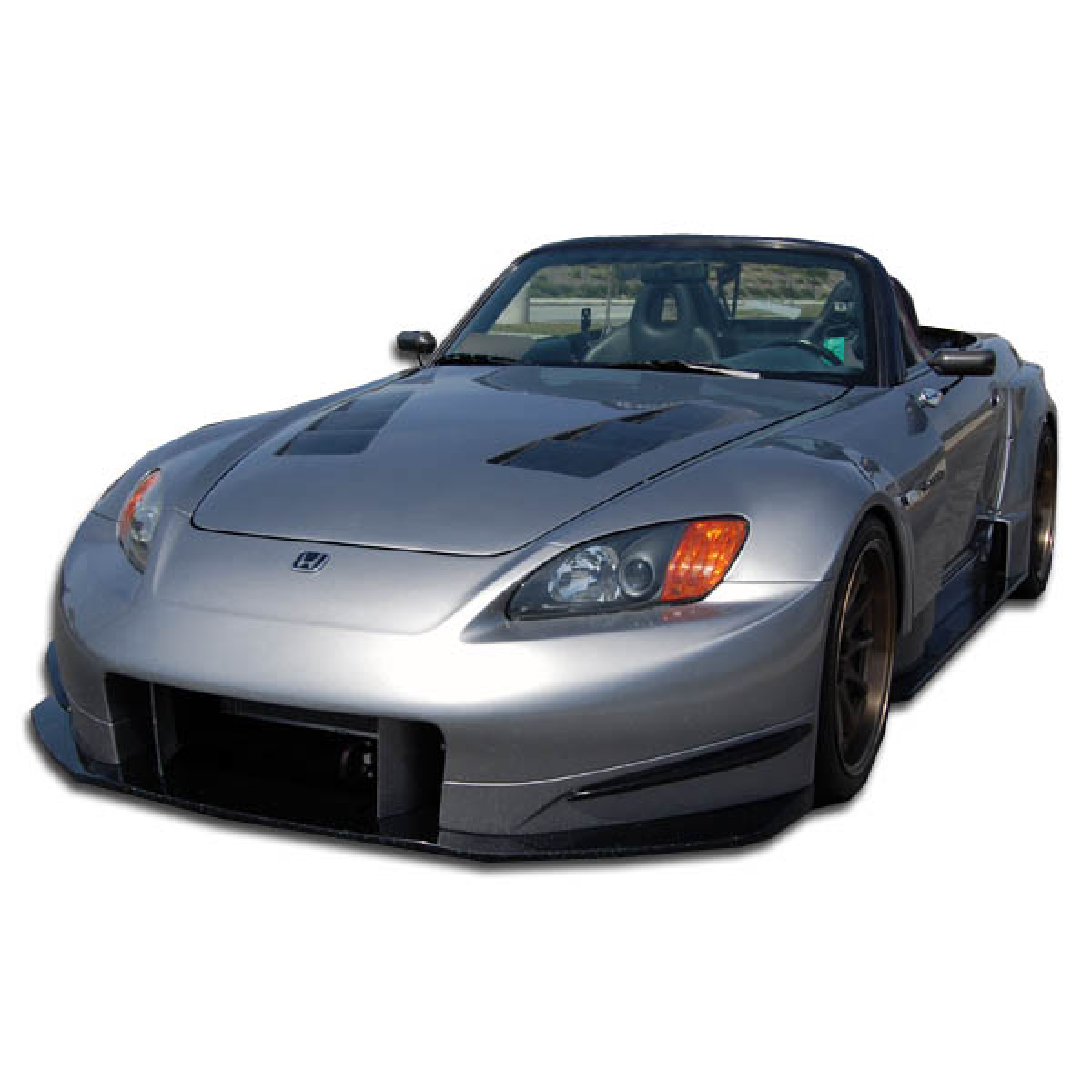 Modify your Honda S2000 2000 with our Exterior/Complete Body Kits - Front angle view of vehicle showing body kit features