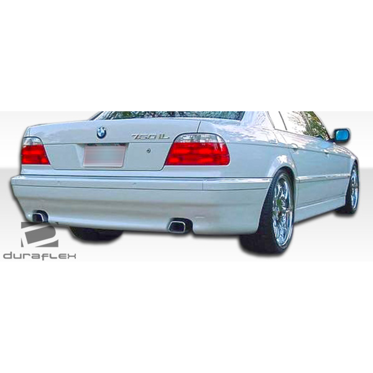 Modify your BMW 7-Series 1995 with our Exterior/Rear Bumpers or Lips - Slightly elevated rear angle view of the car