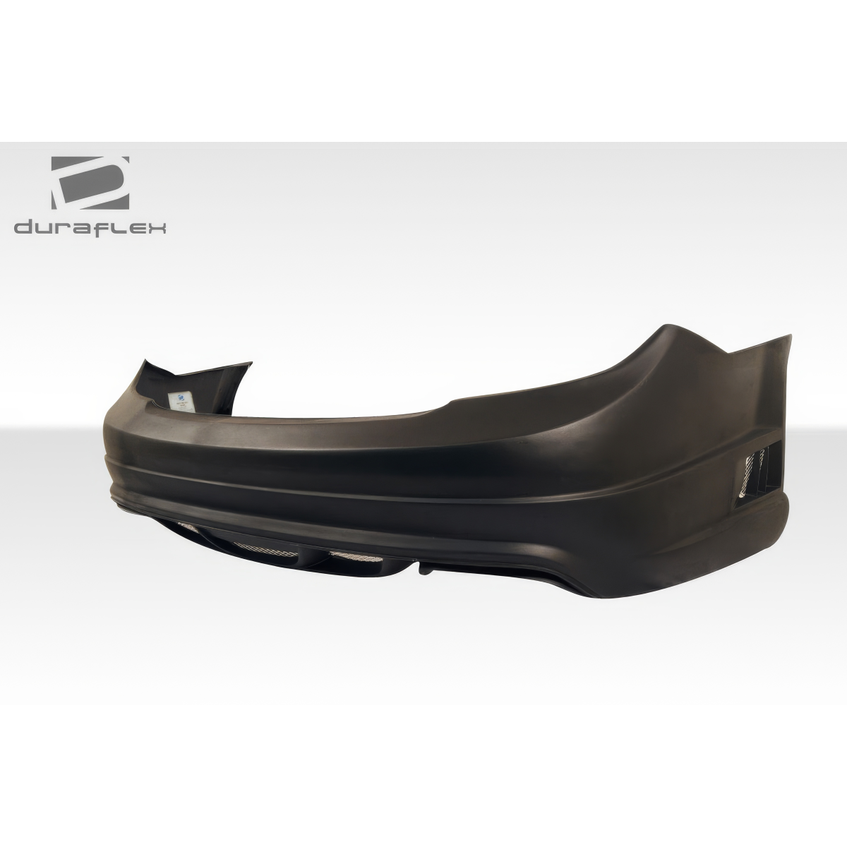 Modify your Mercedes-Benz C300 2008 with our Exterior/Rear Bumpers or Lips - Side angle view of rear bumper part