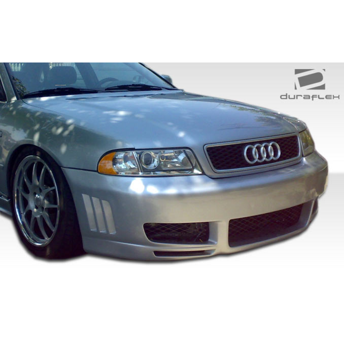 Modify your Audi A4 1996 with our Exterior/Front Bumpers - Front view slightly angled showing bumper features