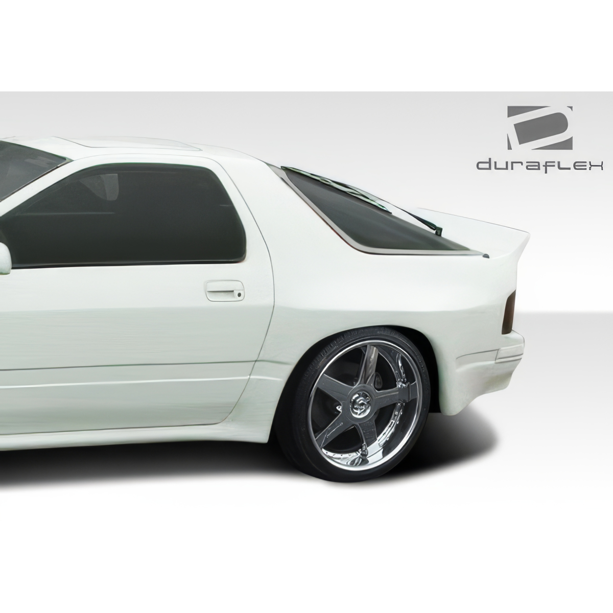 Modify your Mazda RX-7 1986 with our Exterior/Fenders - Side angle view of a modified car fender