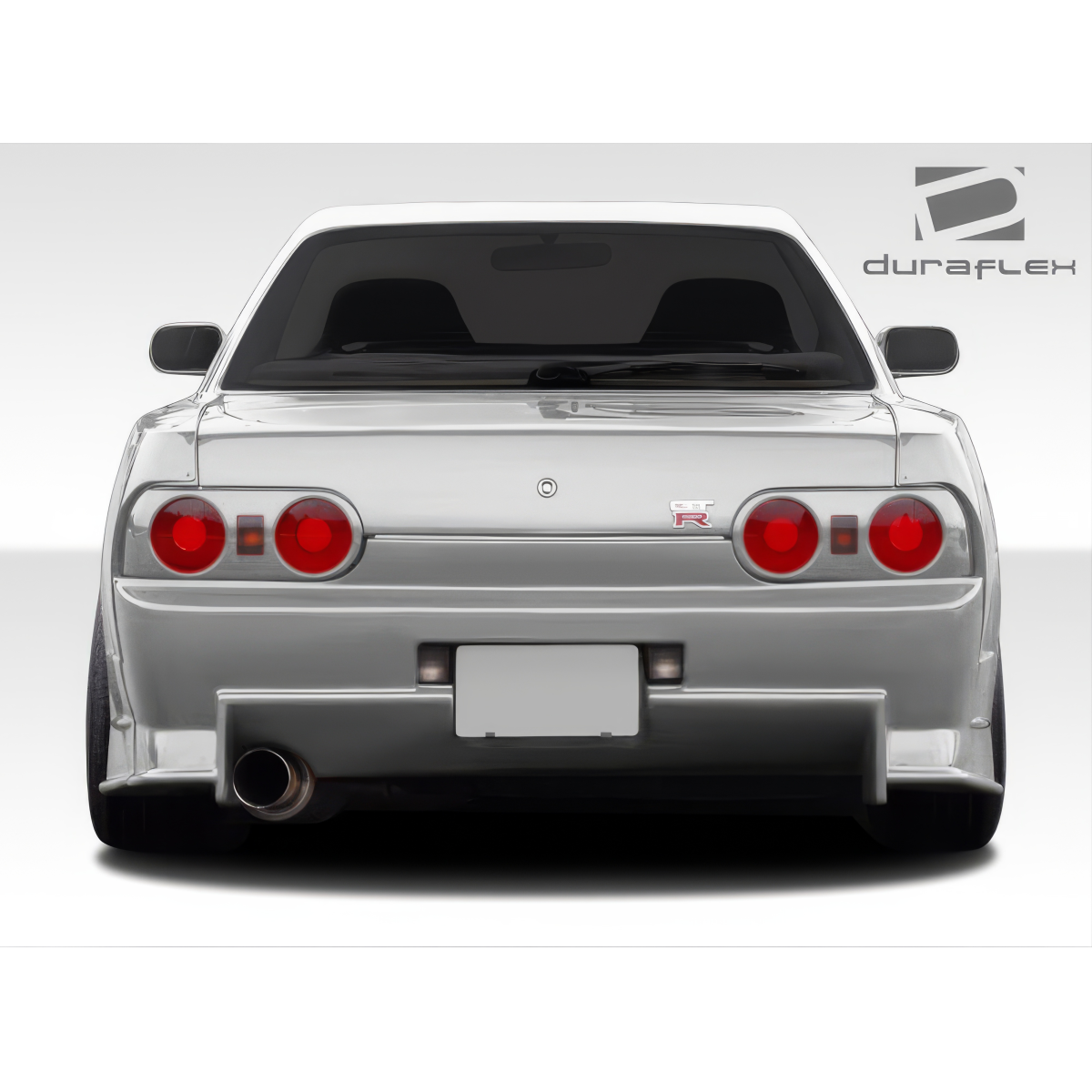 Modify your Nissan Skyline 1989 with our Exterior/Complete Body Kits - Rear view of the vehicle from a straight angle