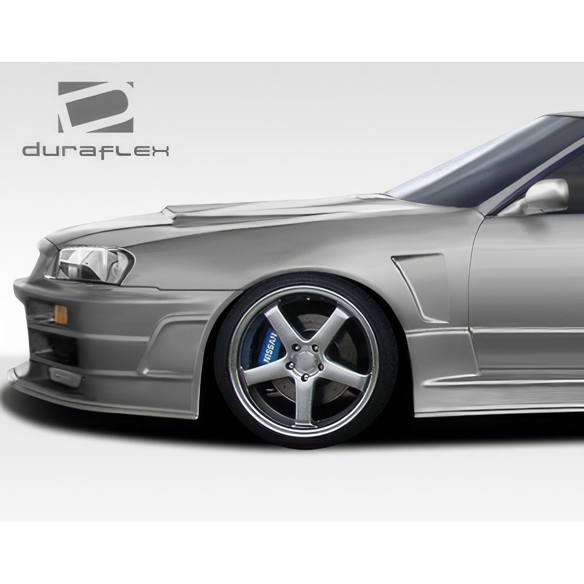 Modify your Nissan Skyline 1989 with our Exterior/Complete Body Kits - Side angle view of Nissan Skyline R32 fenders