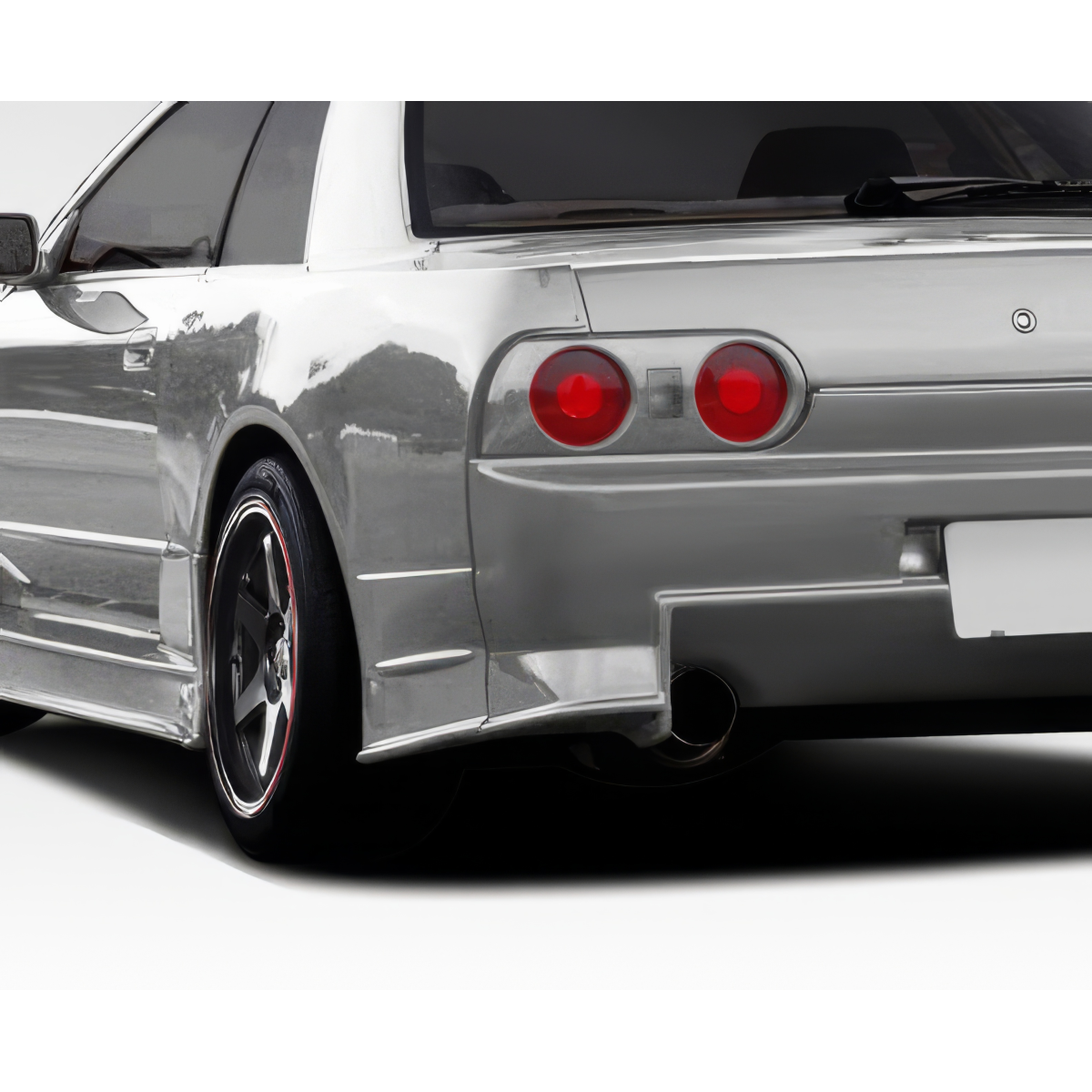 Modify your Nissan Skyline 1989 with our Exterior/Complete Body Kits - Rear angle showcasing fender flares design