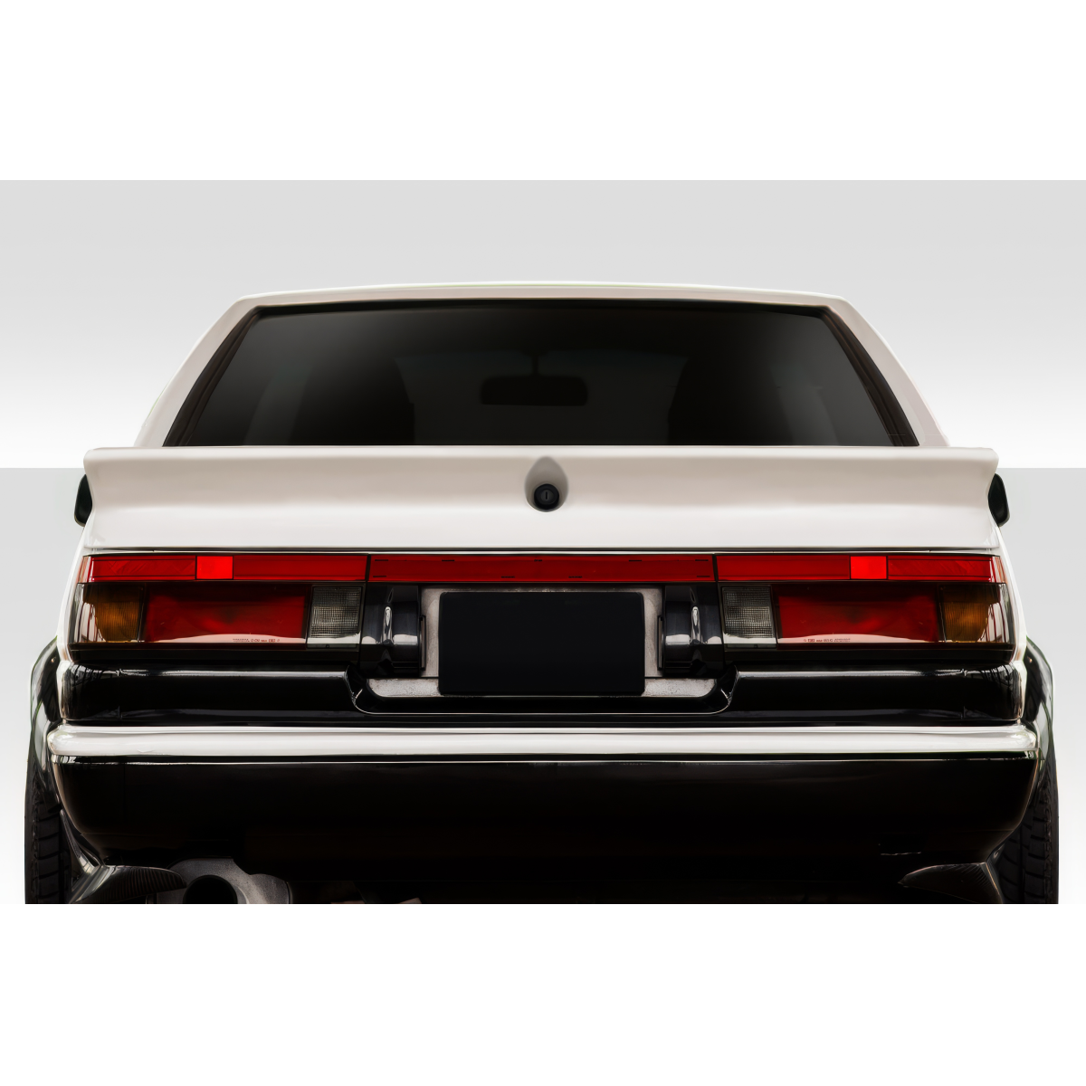 Modify your Toyota Corolla 1984 with our Exterior/Wings - Rear view angle of vehicle trunk lid