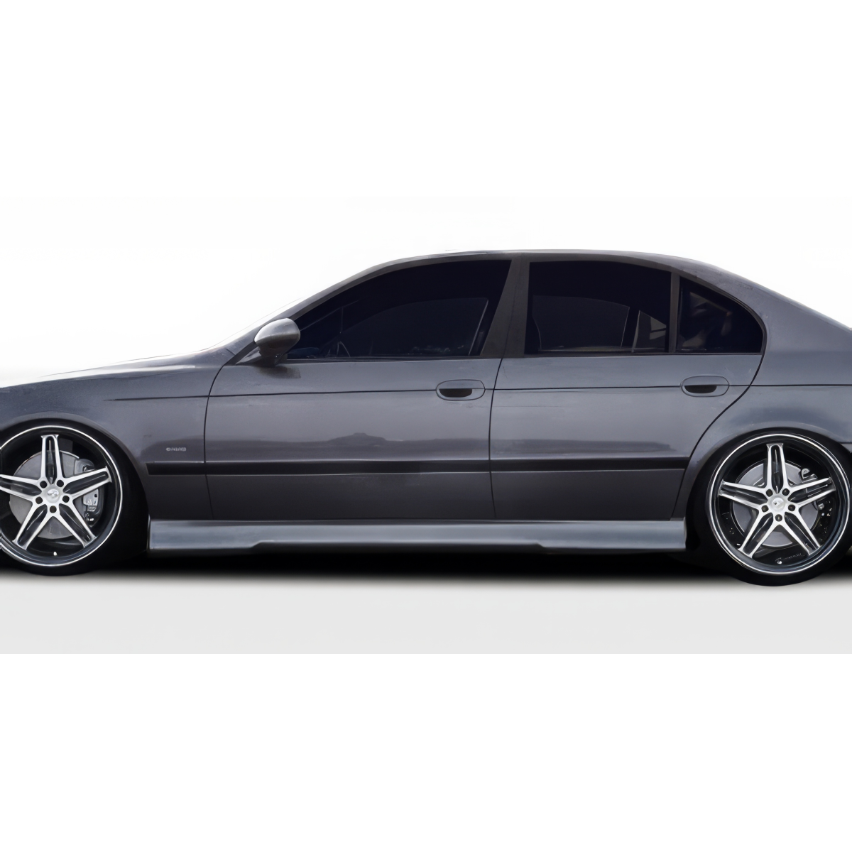 Modify your BMW 4-Series 1997 with our Exterior/Complete Body Kits - Side view of vehicle showcasing side skirts