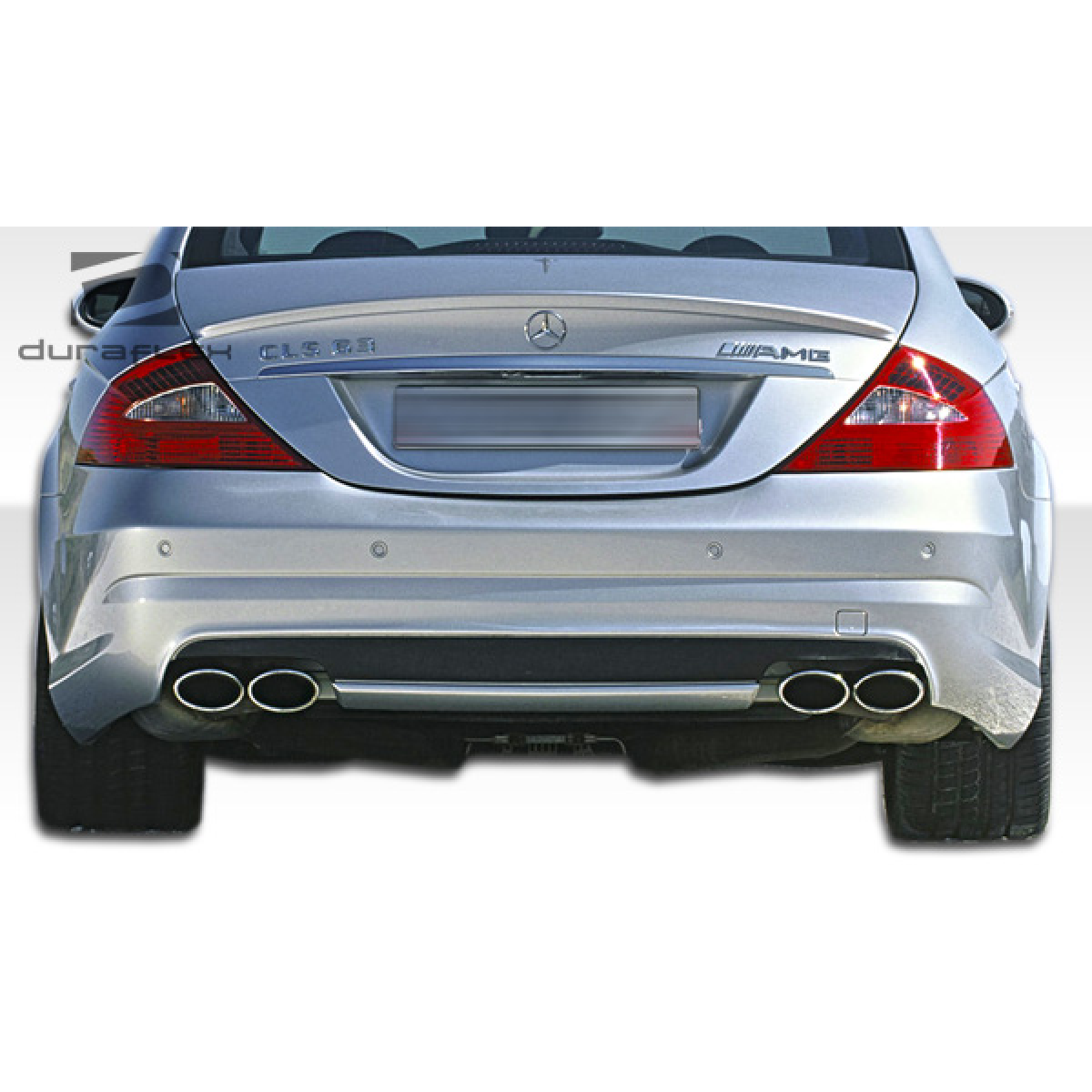 Modify your Mercedes-Benz CLS-Class 2006 with our Exterior/Rear Bumpers or Lips - View from rear angle focused on bumper design