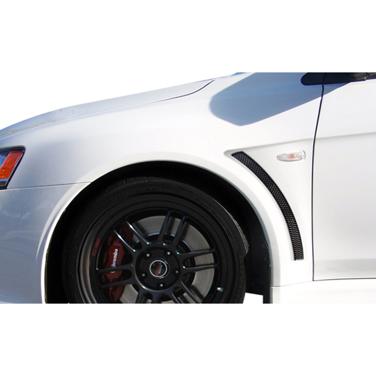 Modify your Mitsubishi Lancer 2008 with our Exterior/Fenders - Front angle showing fender and wheel details