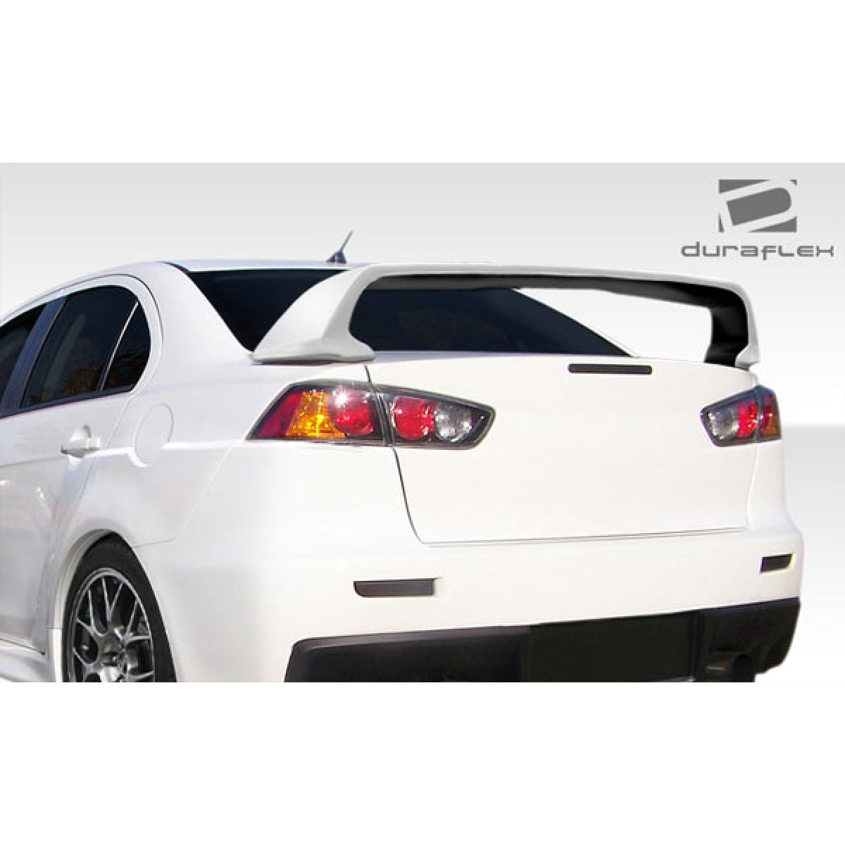 Modify your Mitsubishi Lancer 2008 with our Exterior/Complete Body Kits - View angle from rear right side of the vehicle