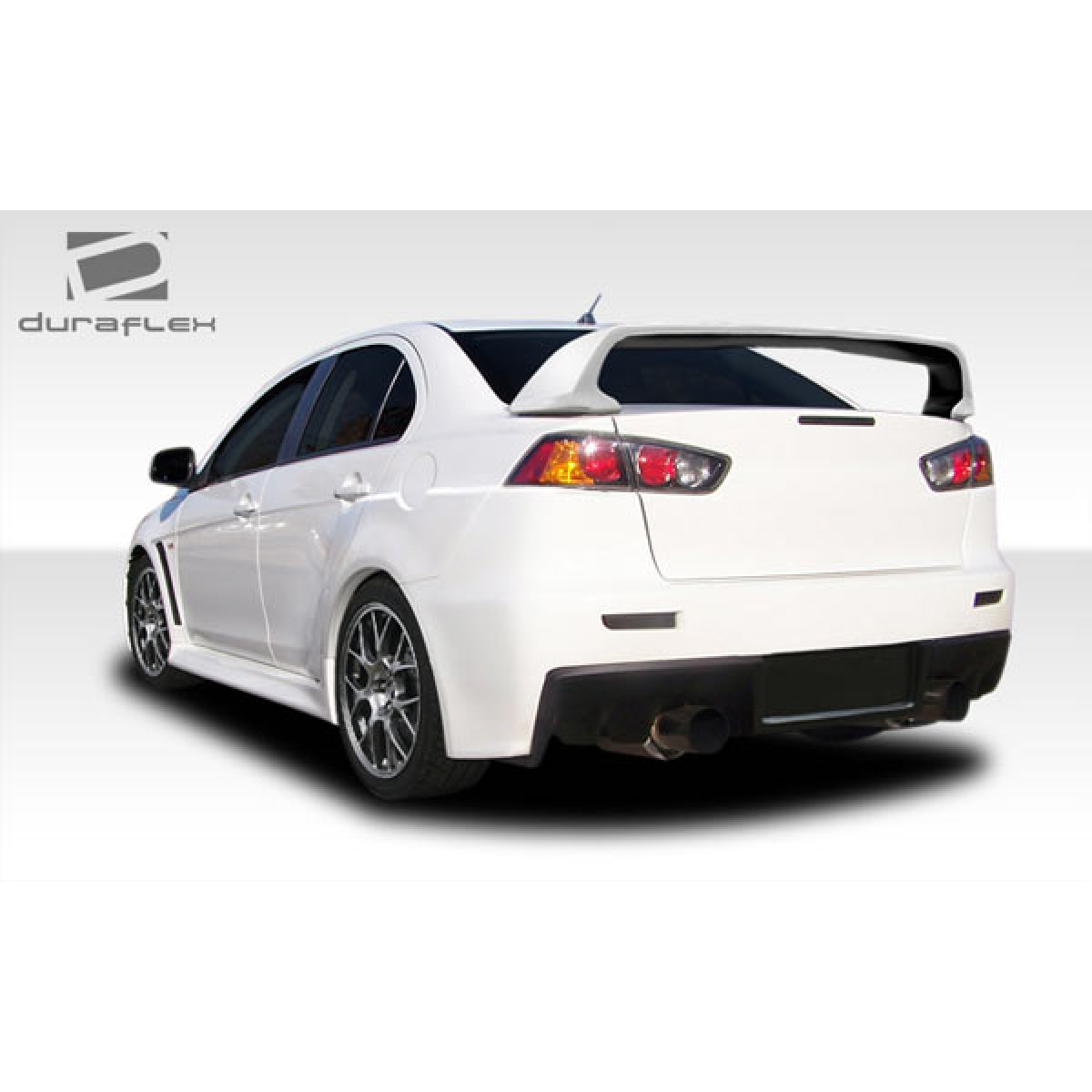 Modify your Mitsubishi Lancer 2008 with our Exterior/Complete Body Kits - Rear angle showcasing the trunk lid spoiler