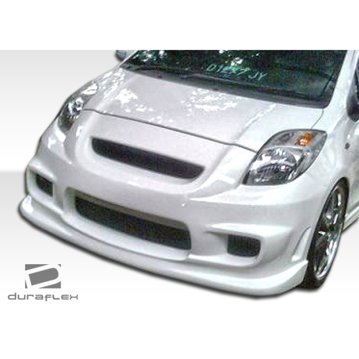 Modify your Toyota Yaris 2007 with our Exterior/Front Bumpers or Lips - Front angle view of a modified bumper