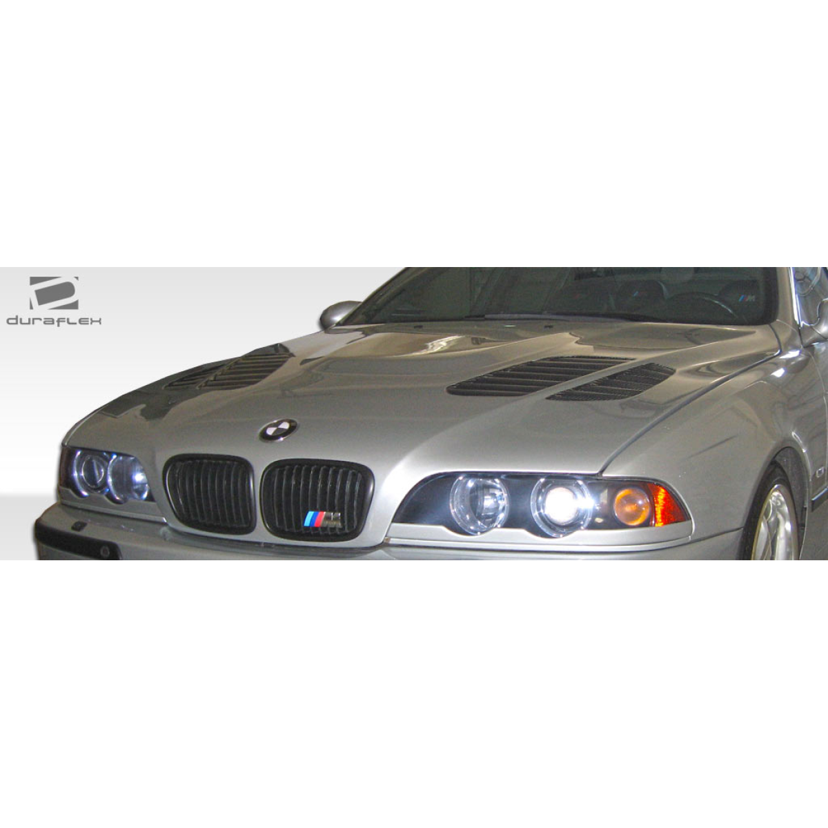 Modify your BMW 5-Series 1997 with our Exterior/Hoods - Front angle showing the hood design and details