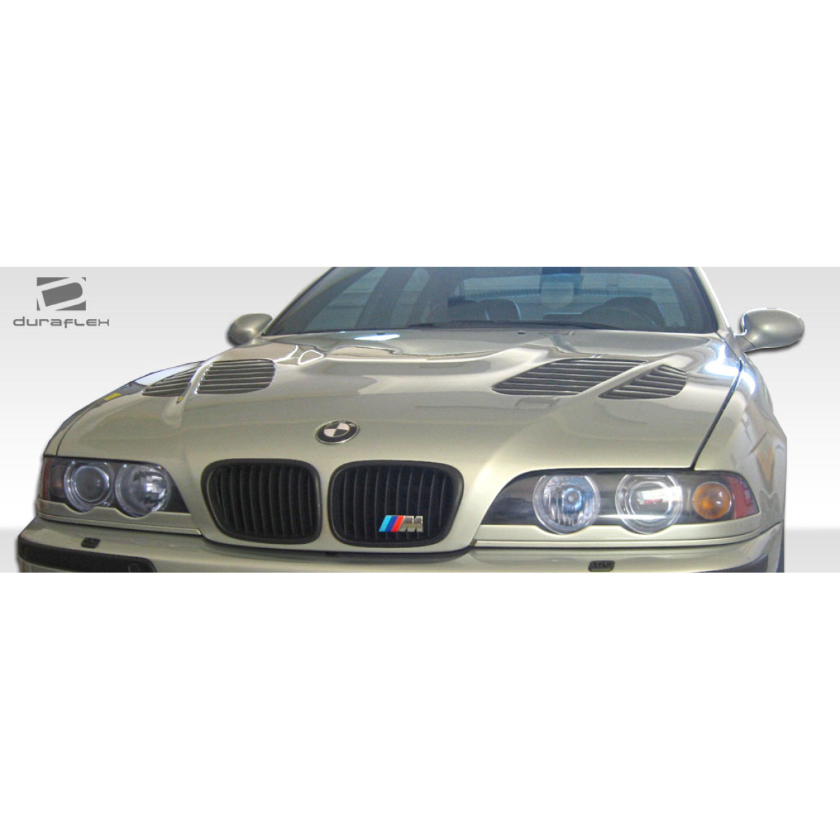 Modify your BMW 5-Series 1997 with our Exterior/Hoods - Front view of the vehicle angled slightly upward