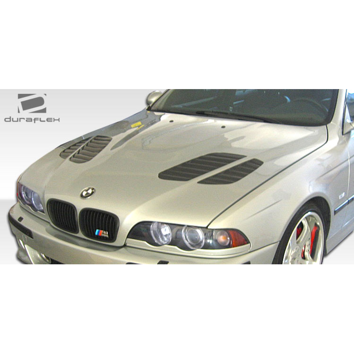 Modify your BMW 5-Series 1997 with our Exterior/Hoods - Top down view of the hood at a slight angle