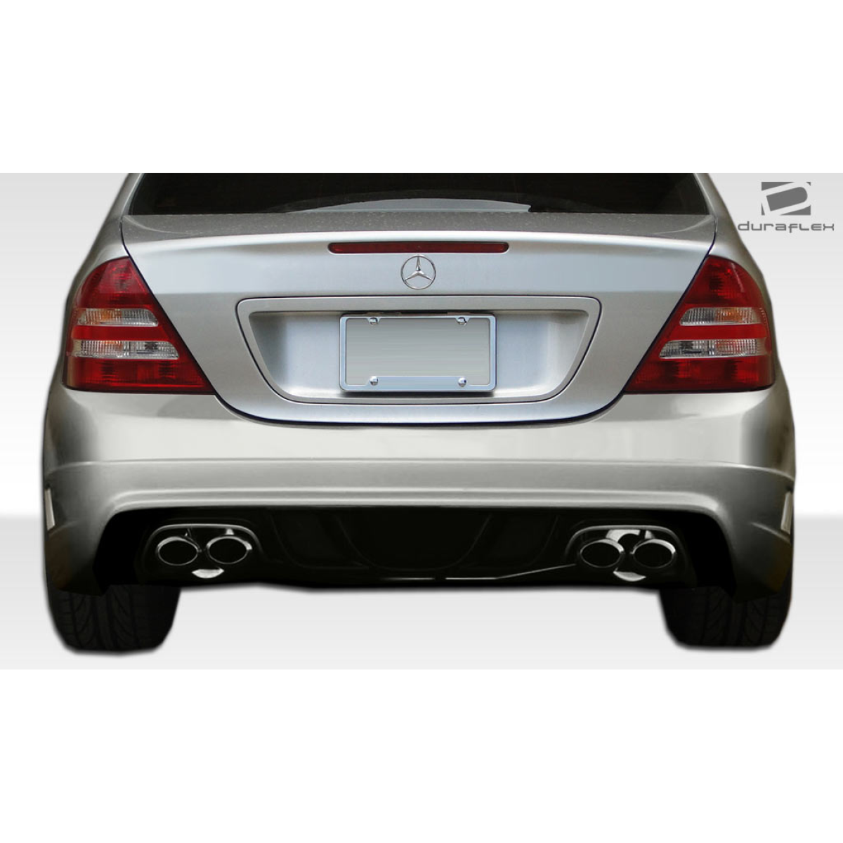 Modify your Mercedes-Benz C230 2001 with our Exterior/Rear Bumpers or Lips - Rear view of vehicle showing bumper and exhaust