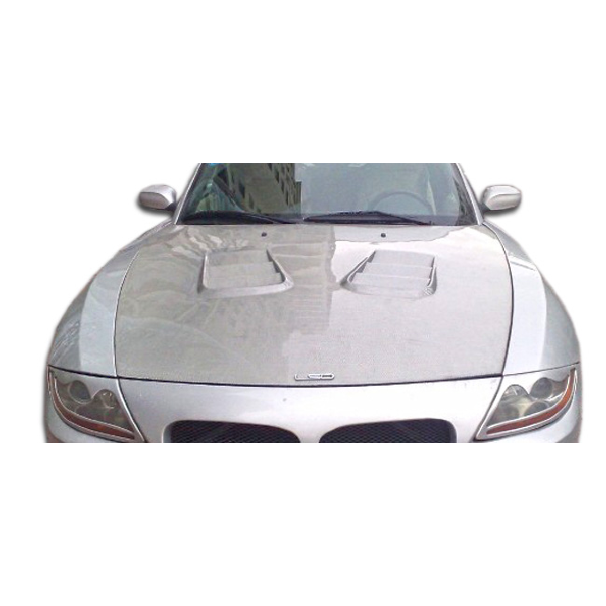 Modify your BMW Z4 2003 with our Exterior/Hoods - Front view of the hood at a slight angle