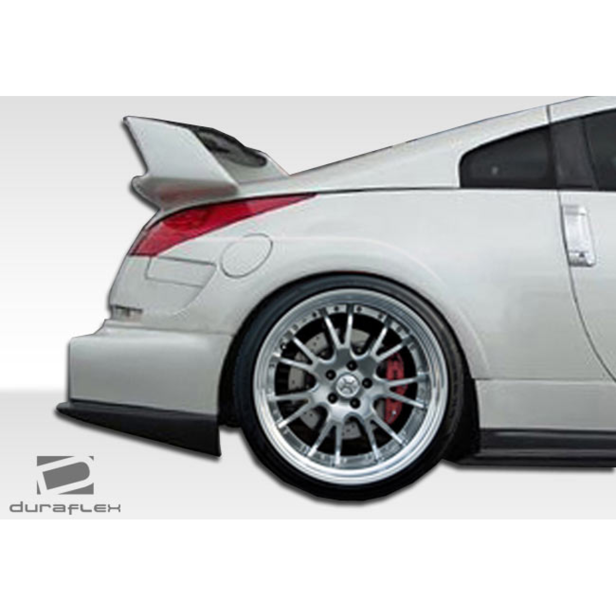 Modify your Nissan 350Z 2003 with our Exterior/Complete Body Kits - Rear angle view of Nissan 350Z showcasing fender flares