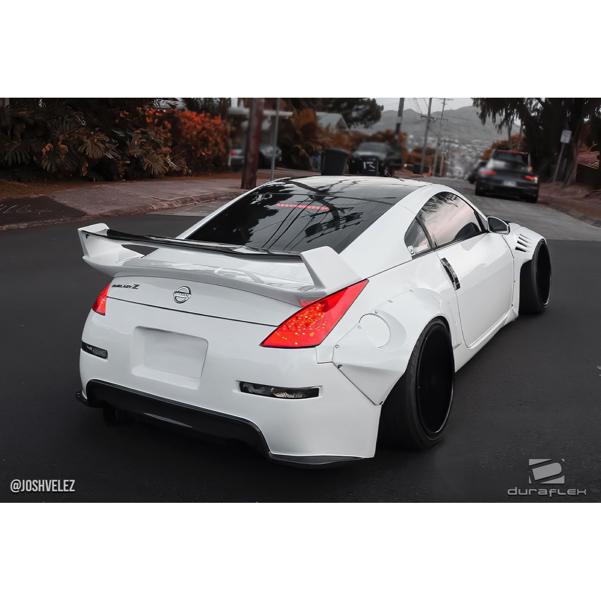 Modify your Nissan 350Z 2003 with our Exterior/Complete Body Kits - Car viewed from rear at a slight angle