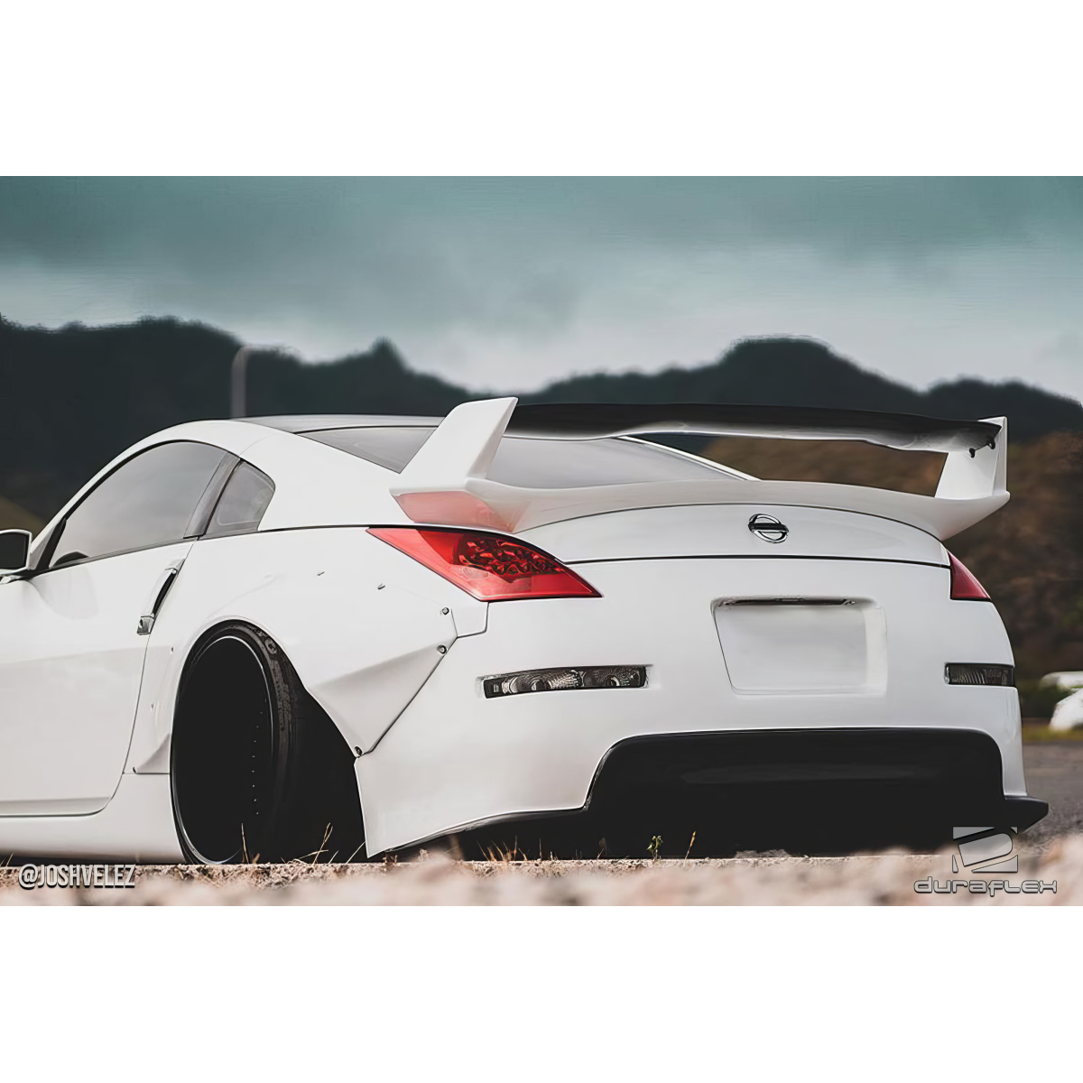 Modify your Nissan 350Z 2003 with our Exterior/Complete Body Kits - Slightly angled from the rear near ground level