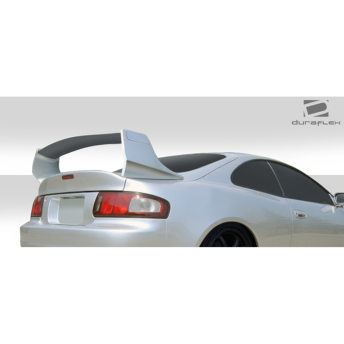 Modify your Toyota Celica 1994 with our Exterior/Wings - Rear view at a slight angle showcasing the wing