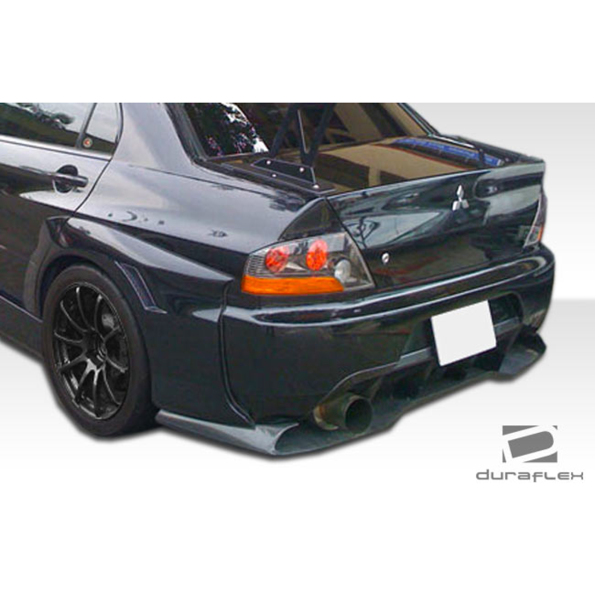 Modify your Mitsubishi Evolution 2003 with our Exterior/Complete Body Kits - Rear angle showing body kit on Mitsubishi Evolution