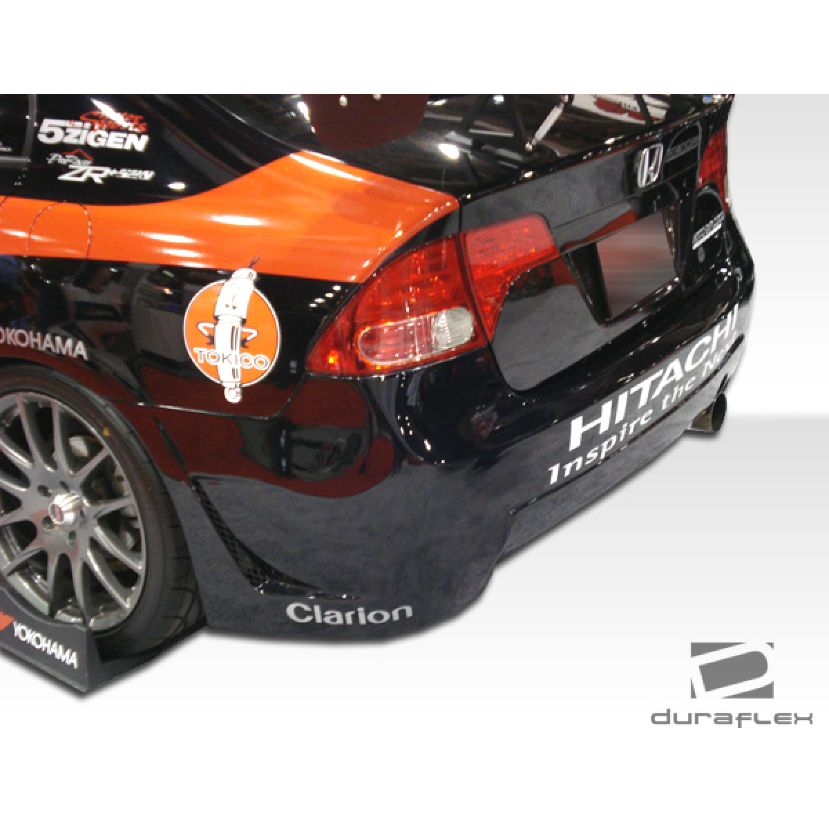 Modify your Honda Civic 2006 with our Exterior/Complete Body Kits - Rear angle of the Honda Civic showing body kit