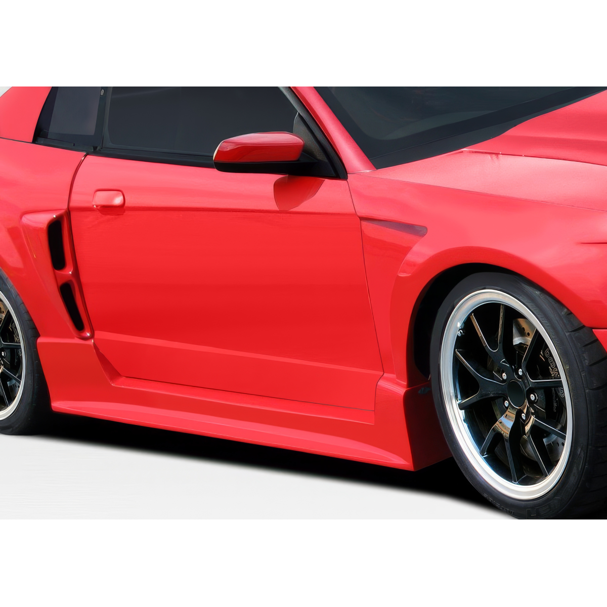 Modify your Ford Mustang 1999 with our Exterior/Complete Body Kits - Angled view of the red Mustang side panel