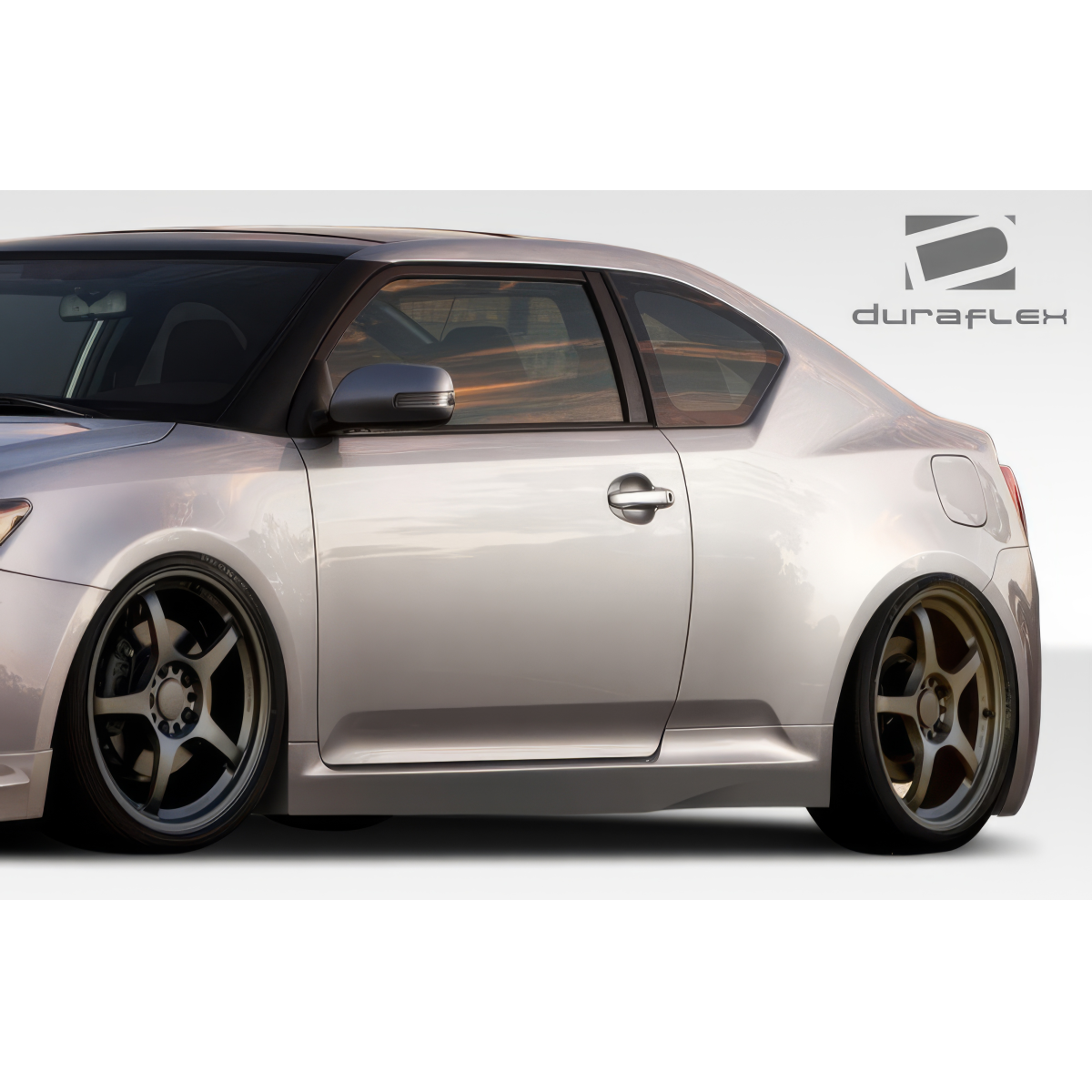 Modify your Scion tC 2011 with our Exterior/Side Skirts - Side view angle of the vehicle showing skirts