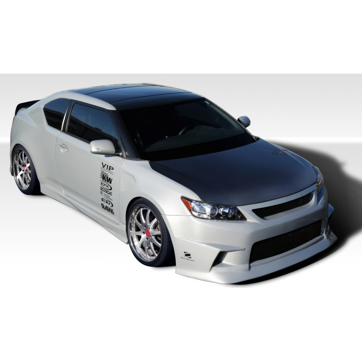 Modify your Scion tC 2011 with our Exterior/Complete Body Kits - Car viewed from high angle showing body kit features