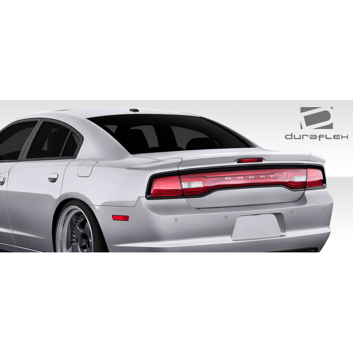 Modify your Dodge Charger 2011 with our Exterior/Wings - Rear angle view of a Dodge Charger with spoiler