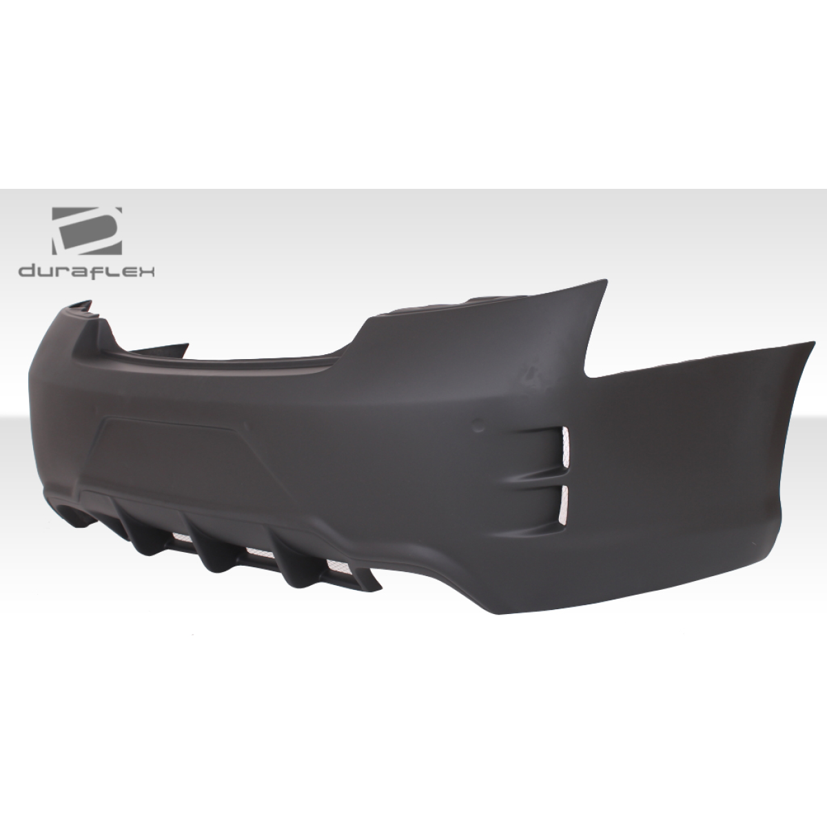 Modify your Infiniti G 2007 with our Exterior/Complete Body Kits - Side profile angle of rear bumper part