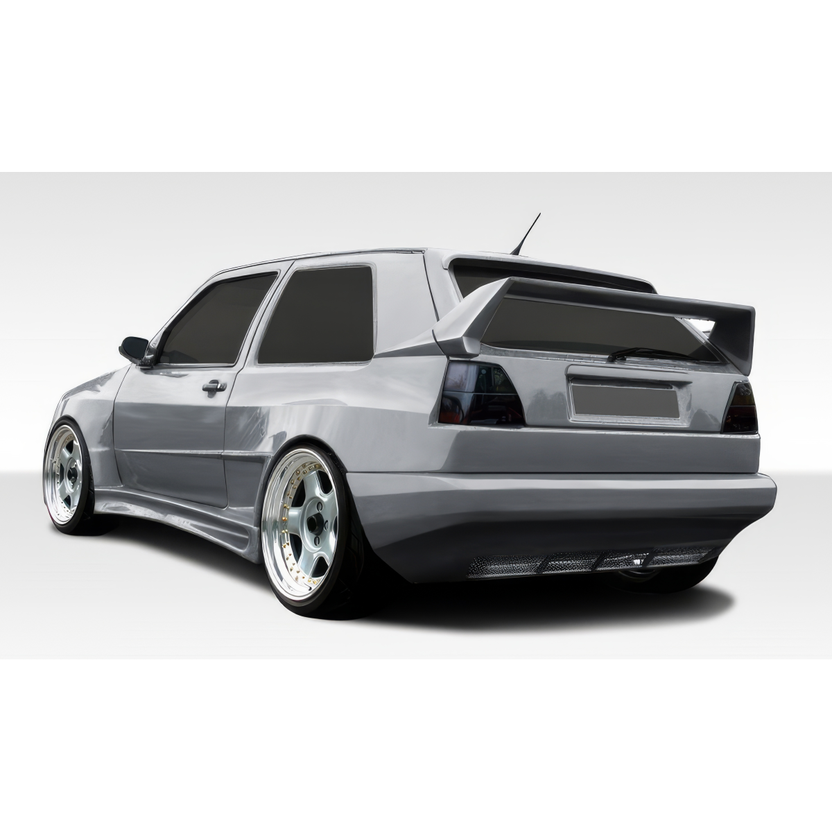 Modify your Volkswagen Golf 1985 with our Exterior/Rear Bumpers or Lips - Rear angle emphasizing the wide body design