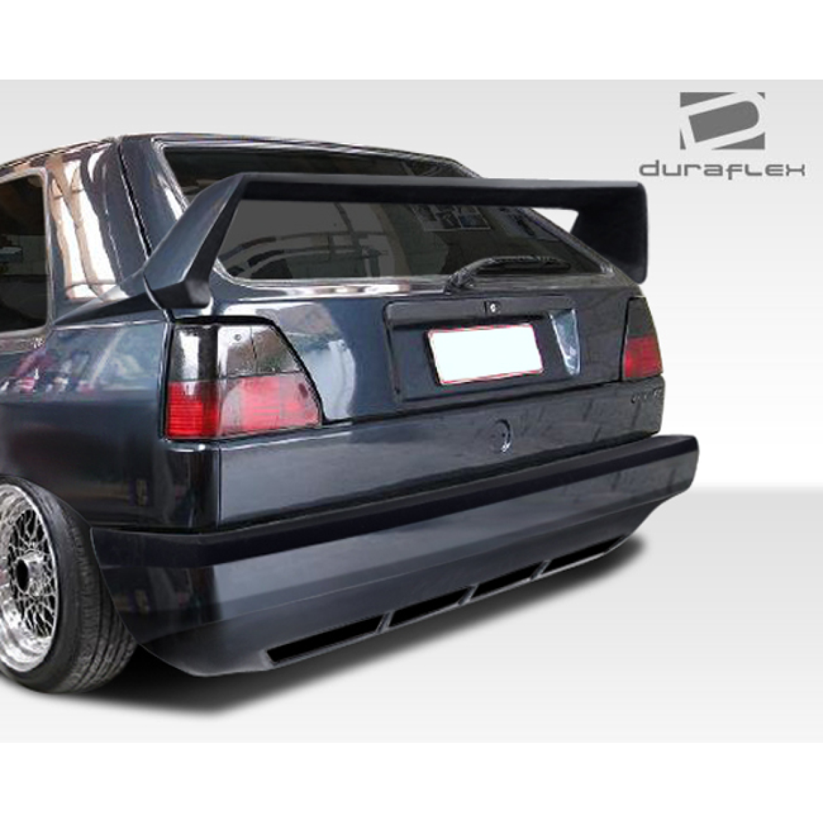 Modify your Volkswagen Golf 1985 with our Exterior/Rear Bumpers or Lips - Rear angle view of Volkswagen Golf showing bumper