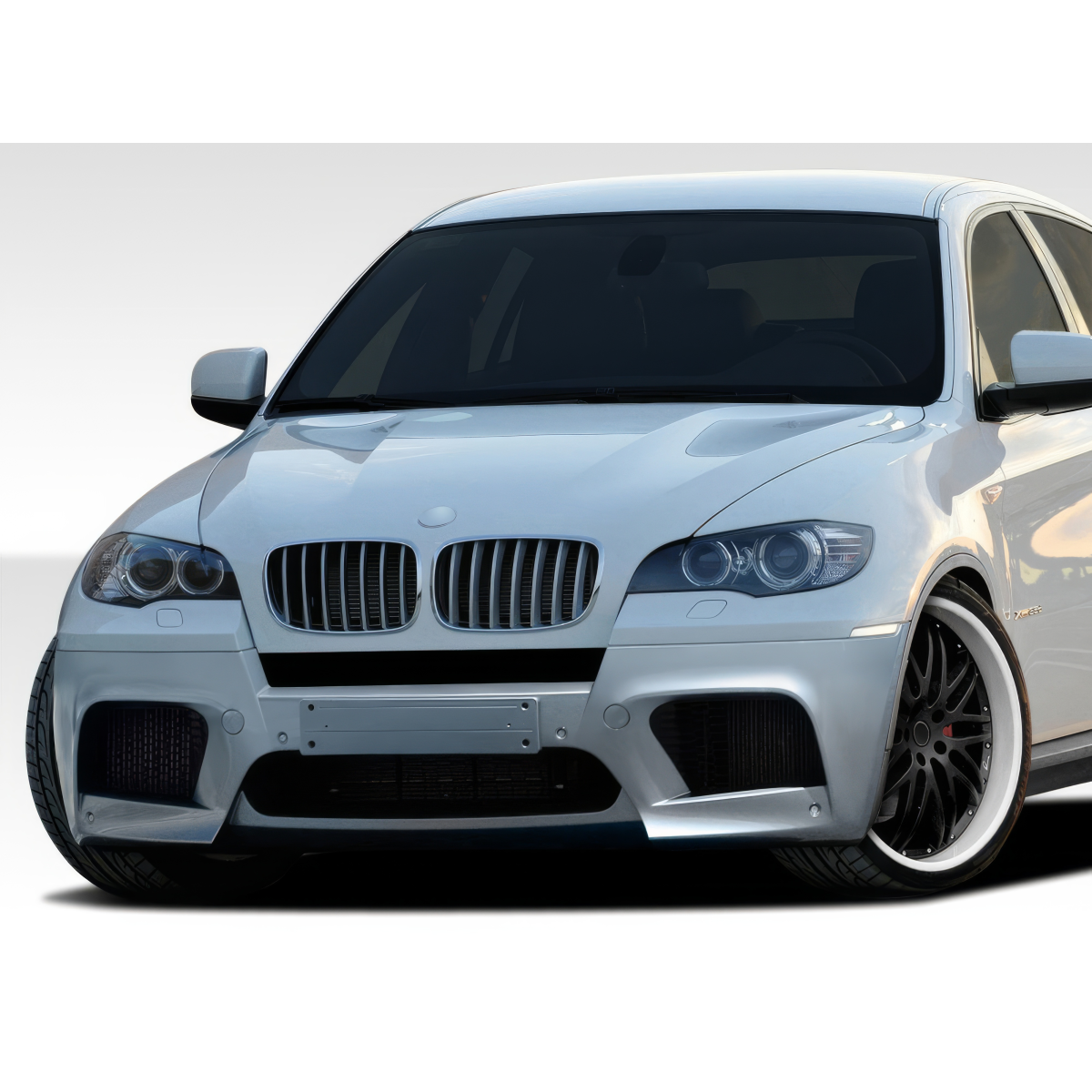 Modify your BMW X5M 2008 with our Exterior/Front Bumpers or Lips - Front angle view of the vehicle