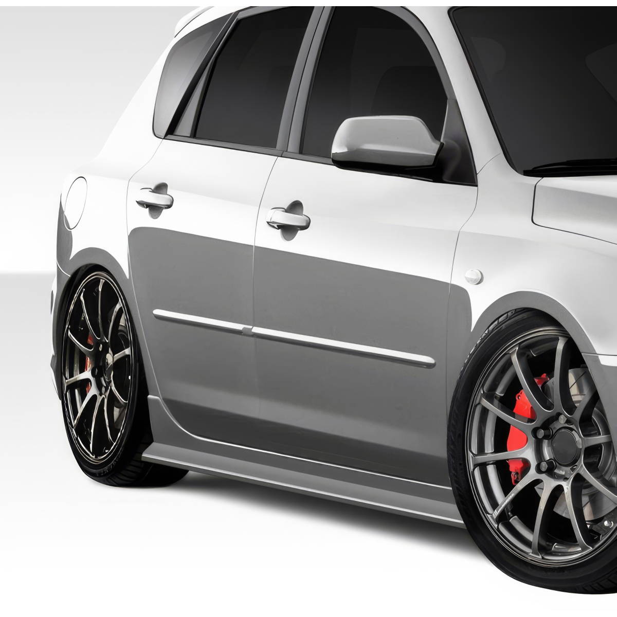 Modify your Mazda 3 2004 with our Exterior/Side Skirts - Side view angle showing the Mazda 3 side skirts